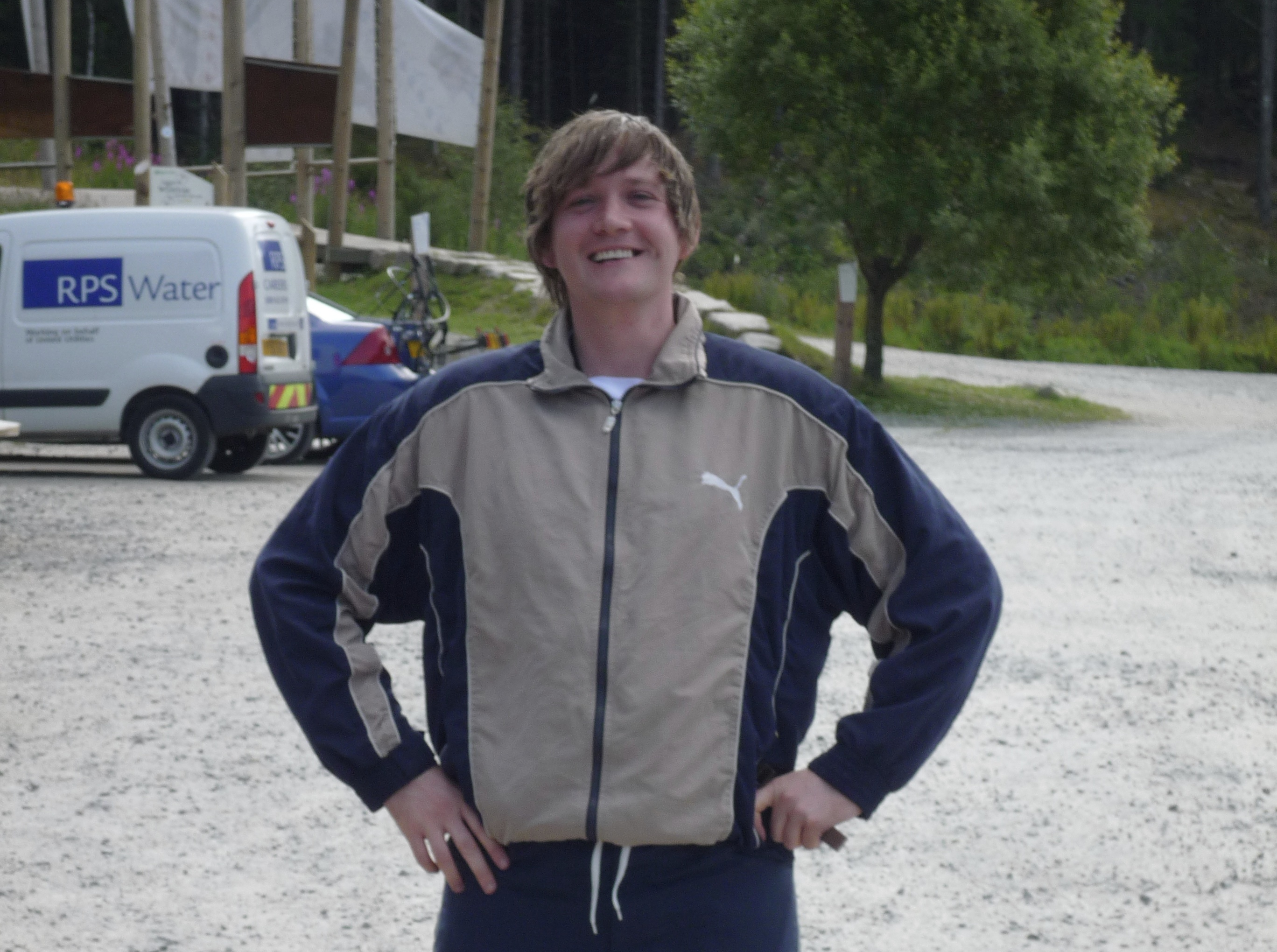 John Maurice Aitken smiling at the camera.